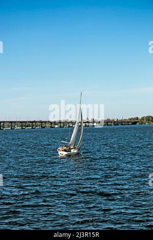 Sailing yacht on the Dnieper river in windy weather. Stock Photo