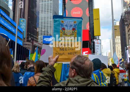 Hundreds gather holding pro Ukraine signs at Times Square in New York City to stand in Solidarity with Ukraine on April 09, 2022. Stock Photo