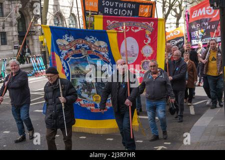 London, UK. 9th April 2022. On the march. Trade unionists and others in the Labour movement march from Parliament Square to a rally at Downing St demanding an end to Putin's war in Ukraine, withdrawal of Russian troops and making refugees welcome here. The Ukraine Solidarity Campaign protest was supported by Ukrainian trade union federations and UK unions including the GMB, PCS, CWU, ASLEF, NUM and  BFAWU. Peter Marshall/Alamy Live News Stock Photo