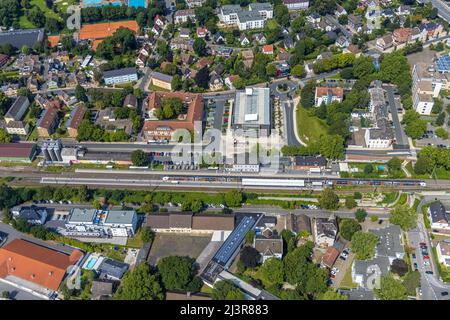 Aerial view, Kamen railway station with multi-storey car park and building of the Unna district police authority Kamen police station, Kamen, Ruhr are