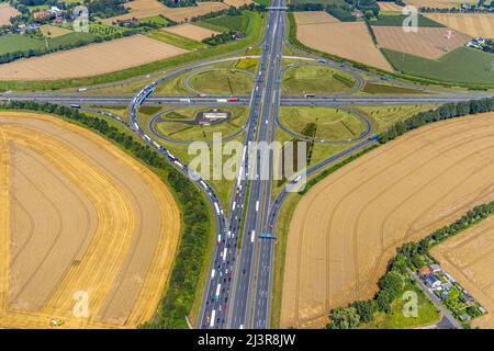 Aerial view, Kamener intersection with motorway A1 and motorway A2, helicopter sculpture Yellow Angel in inner circle, Kamen, Ruhr area, North Rhine-W Stock Photo