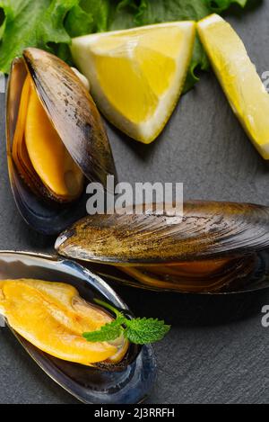 Shellfish dish. Seafood dishes. Mussels in sauce. Stock Photo