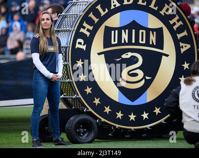 Chester, Pennsylvania, USA. 9th Apr, 2022. April 9, 2022, Chester PA- Former U.S. Women's National Soccer Team player, HEATHER O'REILLY, prepares to beat the Union drum at the start of the match at Subaru Park (Credit Image: © Ricky Fitchett/ZUMA Press Wire) Stock Photo
