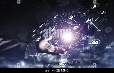 Presenting modern wireless technologies as means of communucation and networking on dark background Stock Photo