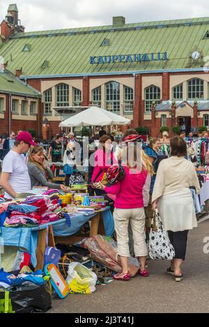 Flea market at Hietalahti square in front of the old Hietalahti Market Halli in Helsinki Finalnd Stock Photo