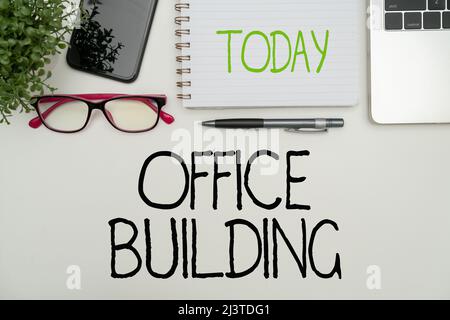 Handwriting text Office Building. Word Written on Commercial buildings are  used for commercial purposes Office Supplies Over Desk With Keyboard And  Stock Photo - Alamy