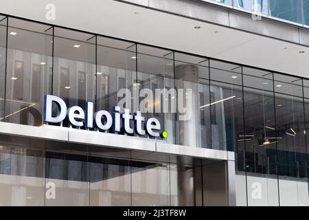The Deloitte logo, a professional services firm, is seen at the front of their office in Toronto. Stock Photo