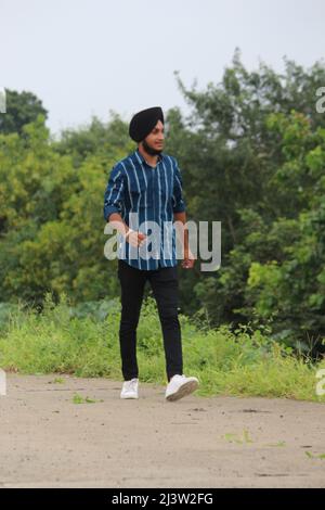 portrait of Young happy Indian sikh handsome man with smile, Mumbai, India, September 2021 Stock Photo