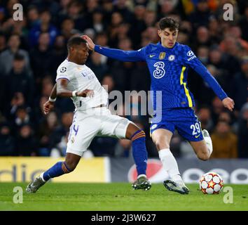 LONDON, United Kingdom, APRIL 06: Chelsea's Kai Havertz takes on David Alaba of Real Madrid CF  during Champions League Quarter-Final between Chelsea Stock Photo