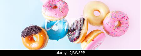 flying doughnuts on blue Stock Photo