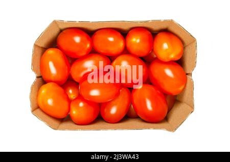 Grape tomatoes in a cardboard tray. Ripe, small, oblong, red cocktail tomatoes in the size of a thumb tip, shaped like a plum tomato, with sweet taste. Stock Photo