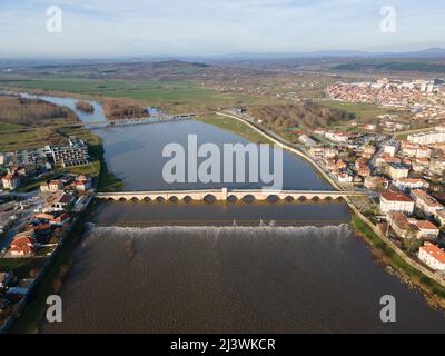 Aerial view of Sixteenth century Mustafa Pasha Bridge (Old Bridge) over Maritsa river in town of Svilengrad, Haskovo Region, Bulgaria Stock Photo