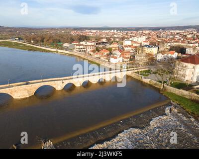 Aerial view of Sixteenth century Mustafa Pasha Bridge (Old Bridge) over Maritsa river in town of Svilengrad, Haskovo Region, Bulgaria Stock Photo