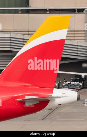 Zurich, Switzerland, March 2, 2022 Rudder and logo on an Iberia Airbus A320-214 aircraft at the international airport