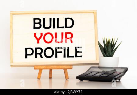 text Build your profile on torn paper, business concept Stock Photo