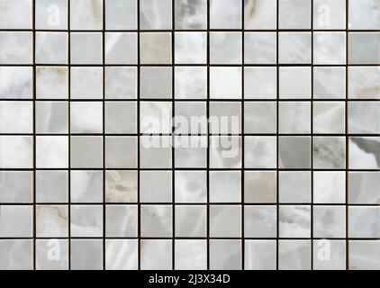 Ceramic mosaic tile with gray and white squares and marble texture. Stock Photo