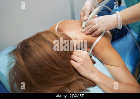 Woman having carboxytherapy procedure in medical center Stock Photo