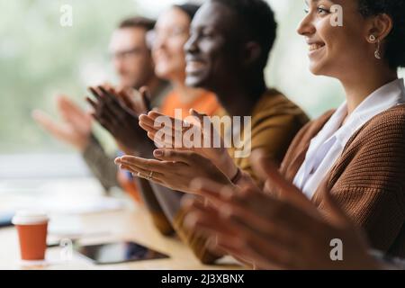 group of diverse business people applauding together. Stock Photo