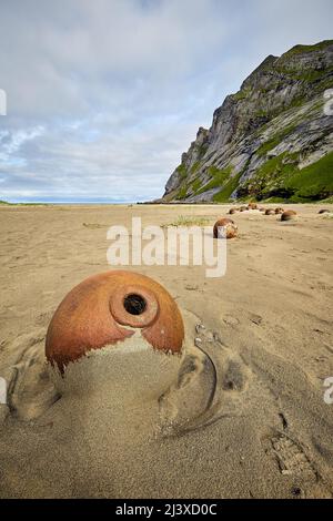 Close up of fishermen's round iron balls used for anchoring nets part of  the fisherman's equipment on boat in the marina in Newport, Oregon Stock  Photo - Alamy