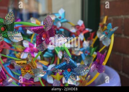 display of childrens windmill toys, england Stock Photo