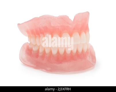 Dental new modern dentures isolated on white. Side view. Stock Photo