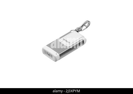 USB flashlight keychain.Metal LED flashlight isolate on a white background. Pocket lamp for dark time of day or dark rooms. Stock Photo