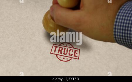 Truce stamp and stamping hand. Armistice, peace, stop war and cease-fire concept. Stock Photo