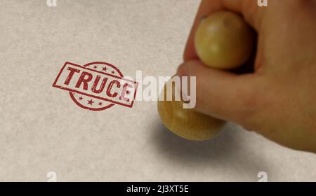 Truce stamp and stamping hand. Armistice, peace, stop war and cease-fire concept. Stock Photo