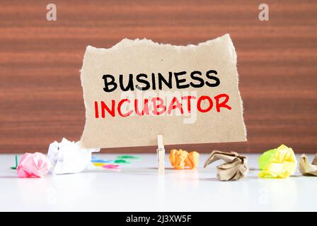 Business incubator text concept isolated over white background. Stock Photo