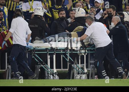 ISTANBUL - A supporter is drained during the Turkish Superliga match between Fenerbahce AS and Galatasaray AS at Ulker Fenerbahce Sukru Saracoglu Stadium on April 10, 2022 in Istanbul, Turkey. ANP | Dutch Height | Gerrit van Keulen Stock Photo