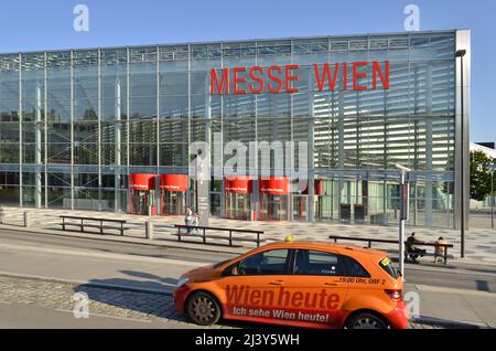 Messe Wien - Exhibition and Congress Center, taxi cab outside modern glass clad venue in Leopoldstadt district of Vienna Austria. Stock Photo