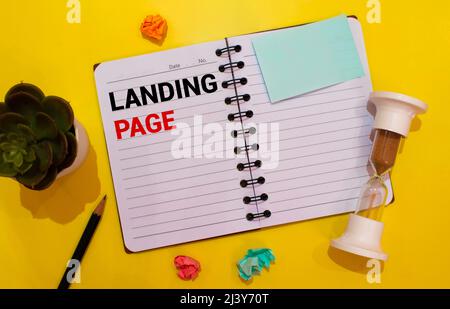 Landing page written in a notebook. SEO concept Stock Photo