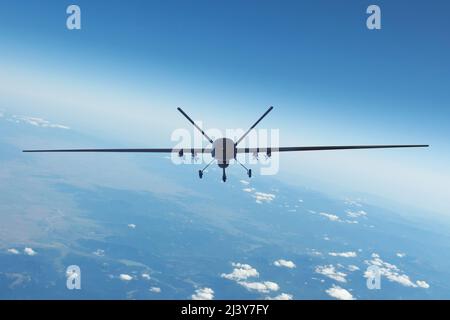 Air Force unmanned aerial vehicle with military equipment flying near base, straight front view Stock Photo