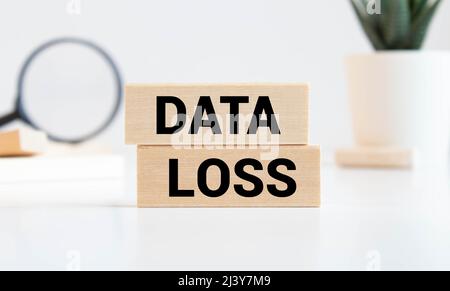 Word writing text Data Loss. Business concept for process or event that results in data being corrupted and deleted Colored crumpled papers empty remi Stock Photo