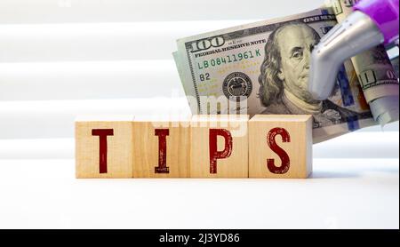 TIPS word written on wooden cubes. Stock Photo