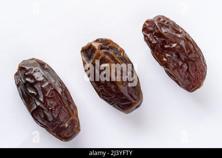 Dates Isolated on White Background Stock Photo