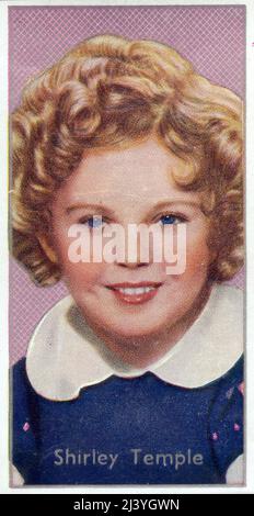 Collectible tobacco card depicting child film star Shirley Temple issued by  Carreras Ltd. in 1936 as part of a series titled Film Stars. Stock Photo