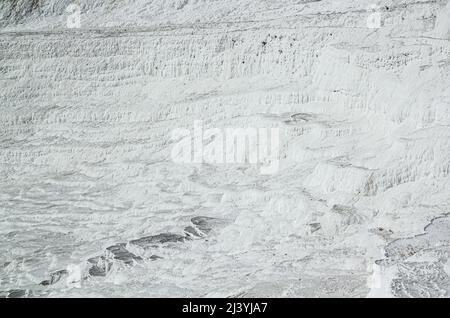 Stone texture covered with calcium deposits. Pamukale texture. Light ...