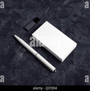 Blank business card, pen and usb flash drive. Stationery mock up. Stock Photo