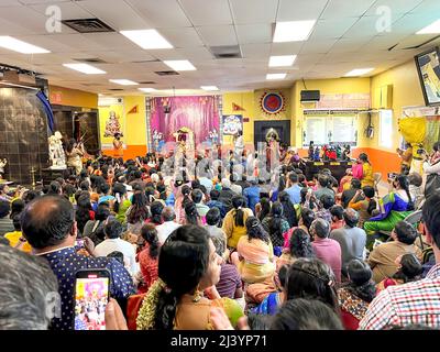 Dublin West Pleasanton, California, USA : 10th April 2022:  Rama Navami (Hindi: राम नवमी) is a Hindu spring festival that celebrates the birthday of Rama, the seventh avatar of the god Vishnu. Rama is particularly important in the Vaishnava tradition of Hinduism. The festival celebrates the descent of Vishnu as the Rama avatar, through his birth to King Dasharatha and Queen Kausalya in Ayodhya, Kosala. The festival is a part of the Chaitra Navaratri in the spring, and falls on the ninth day of the bright half (Shukla Paksha) of Chaitra, the first month in the Hindu calendar. This typically occ Stock Photo