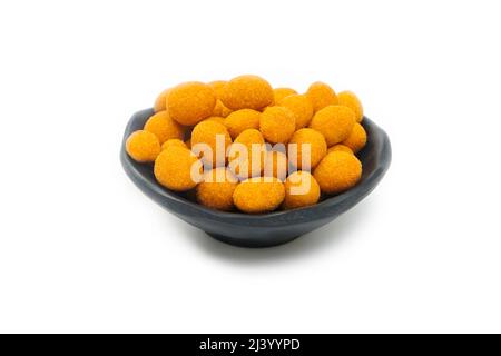 Fried Crispy Chilli Peanuts with Sea Salt and Pepper in a Black Bowl. Appetizer for beer. Stock Photo