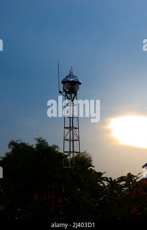 view of mosque loudspeakers and blue sky in the village in the afternoon. the sun has set Stock Photo