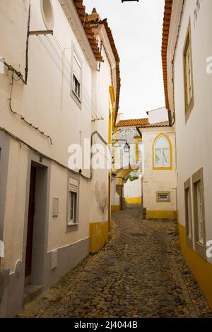 Narrow street of Evora Stock Photo