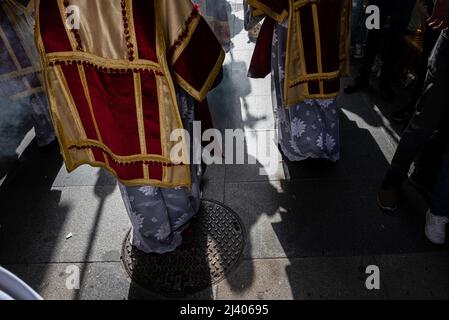 Cadiz, Spain. 11th Apr, 2022. Penitents are seen during a procession to celebrate Palm Sunday, also called Passion Sunday, the first day of Holy Week and the Sunday before Easter, commemorating Jesus Christ's triumphal entry into Jerusalem after two years of Covid-19 travel restrictions and cancellations in Cadiz. Credit: SOPA Images Limited/Alamy Live News Stock Photo