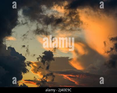 dramatic sunset stormy cloudy sky, background Stock Photo
