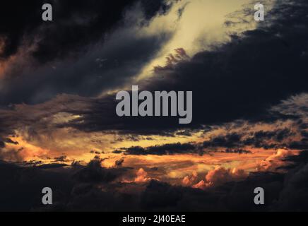 dramatic sunset stormy cloudy sky, background Stock Photo