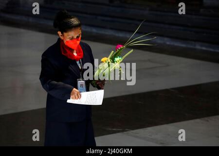 Non Exclusive: MEXICO CITY, MEXICO - APR 10, 2022: Parishioners attend at Palm Sunday mass at the Metropolitan Cathedral to to bless their palm arrang Stock Photo