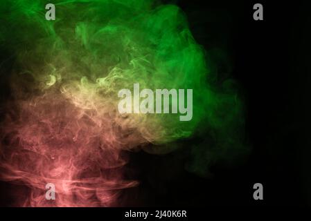 Green And Pink Steam On A Black Background Stock Photo - Download