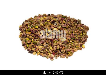 Peeled tasty pistachios as a background. Top view. Stock Photo