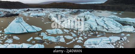 Glacier lake panoramic view with huge icebergs Stock Photo